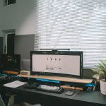 Clean desk setup with ultrawide monitor