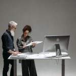 Standing desk in a clean home office setup